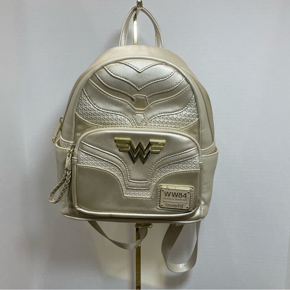 Loungefly Wonder Woman Gold backpack. NWOT. DC comics. Size in photo. - Picture 1 of 15